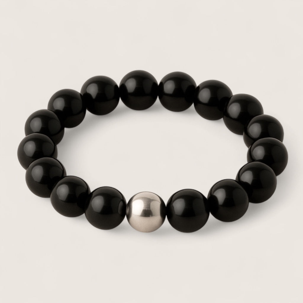 Shadowblade – Black Agate Stretch Bracelet-Forge your style with the Shadowblade Bracelet — polished black agate for strength and grounding. Finished with a steel accent. Available in multiple sizes.