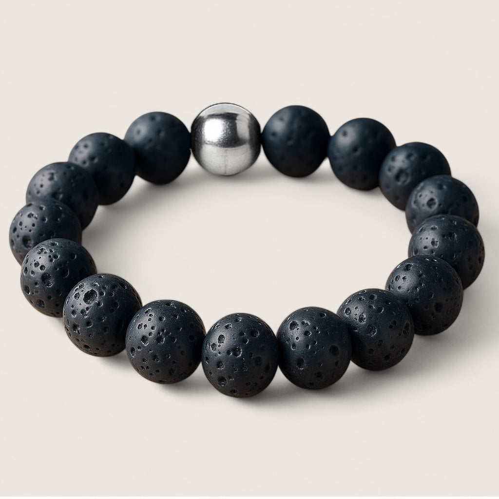 Emberstone – Lava Rock Bracelet-Emberstone Lava Rock Bracelet — crafted from natural volcanic stone, symbolizing strength and calm. Features rugged lava beads and a polished steel accent.