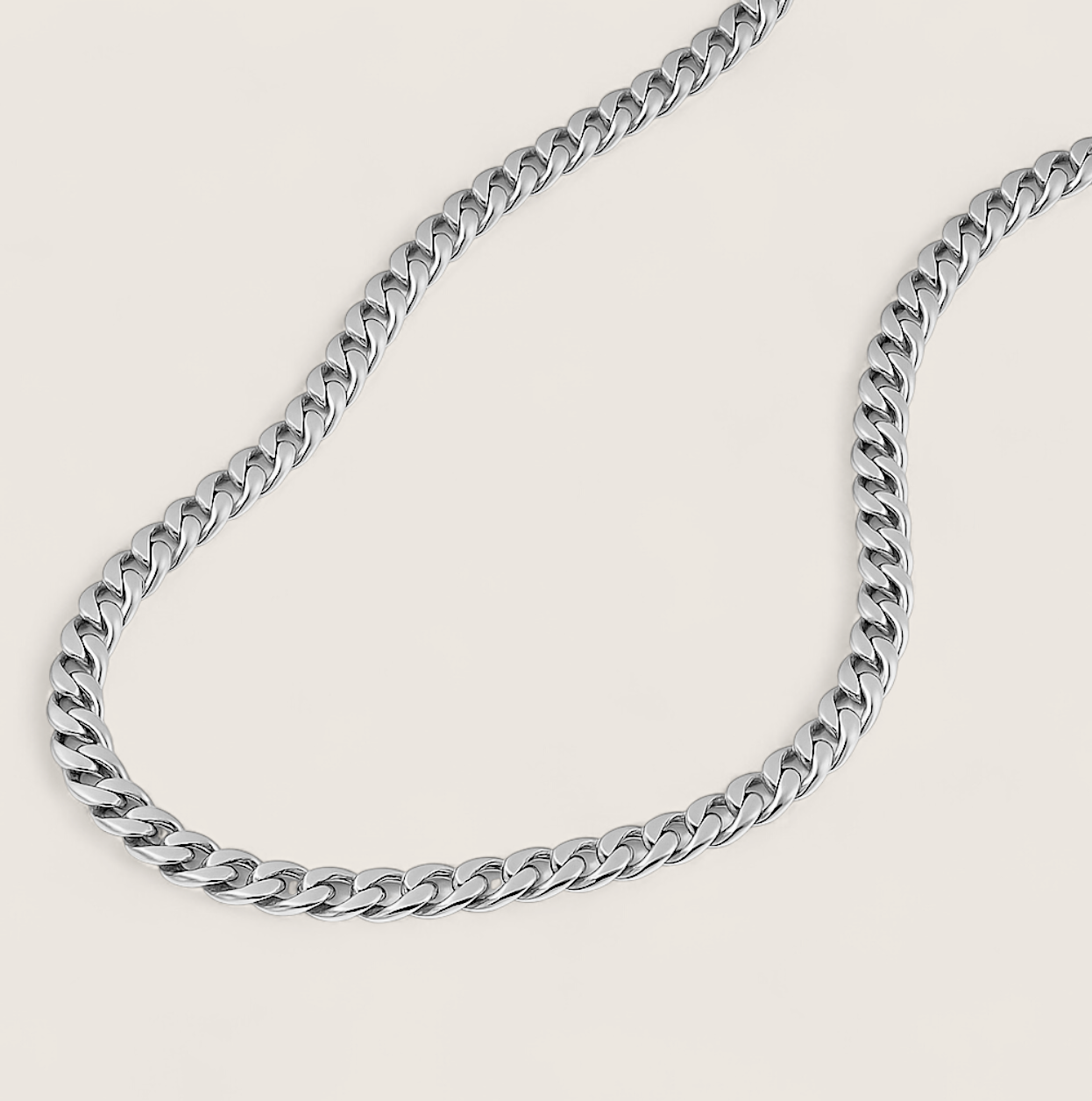 The Argent Curb – 4.5mm Sterling Silver Chain-4.5mm solid sterling silver curb chain. Polished flat links, crafted in Italy. Clean, bold silhouette—wear solo or layered. Shop now.