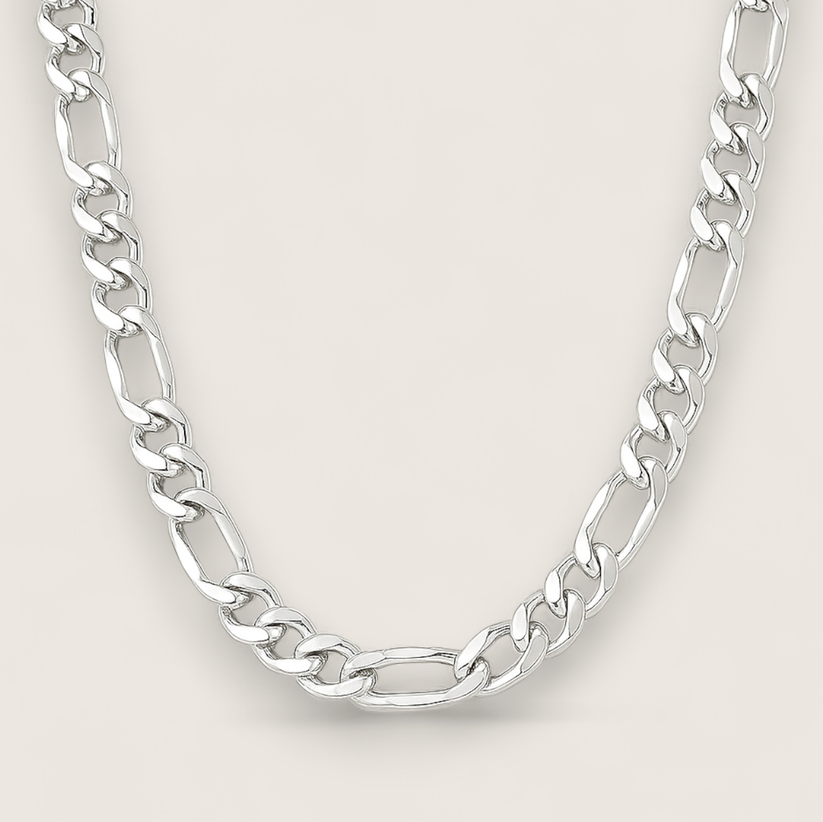 The Argent Figaro – 5.7mm Sterling Silver Chain-Bold 5.7mm sterling silver Figaro chain, diamond-cut for texture and shine. Crafted in Italy. A timeless statement piece. Shop now.