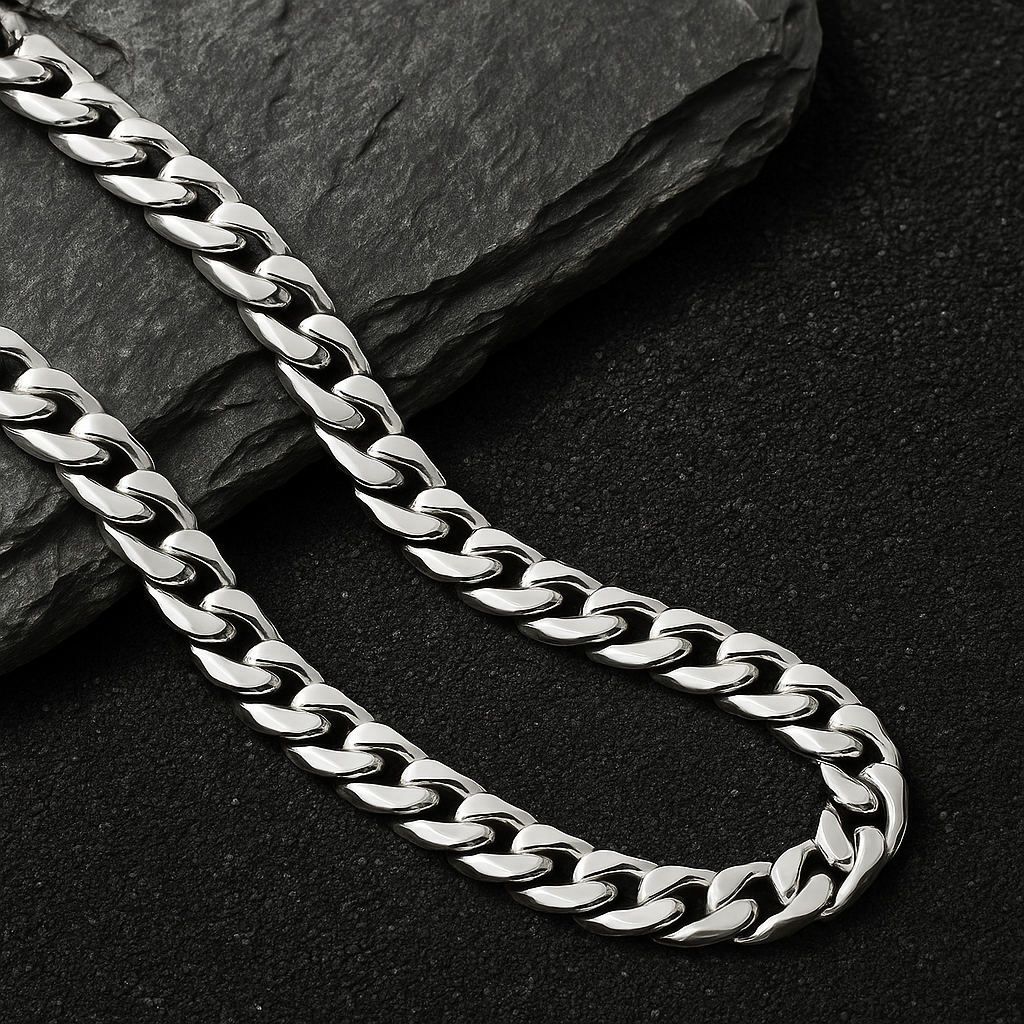 The Argent Curb – 6.7mm Sterling Silver Chain-6.7mm solid sterling silver curb chain. Polished flat links crafted in Italy for bold, versatile style. Wear solo or layered. Shop now.