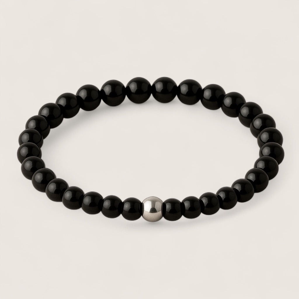 Shadowblade – Black Agate Stretch Bracelet-Forge your style with the Shadowblade Bracelet — polished black agate for strength and grounding. Finished with a steel accent. Available in multiple sizes.