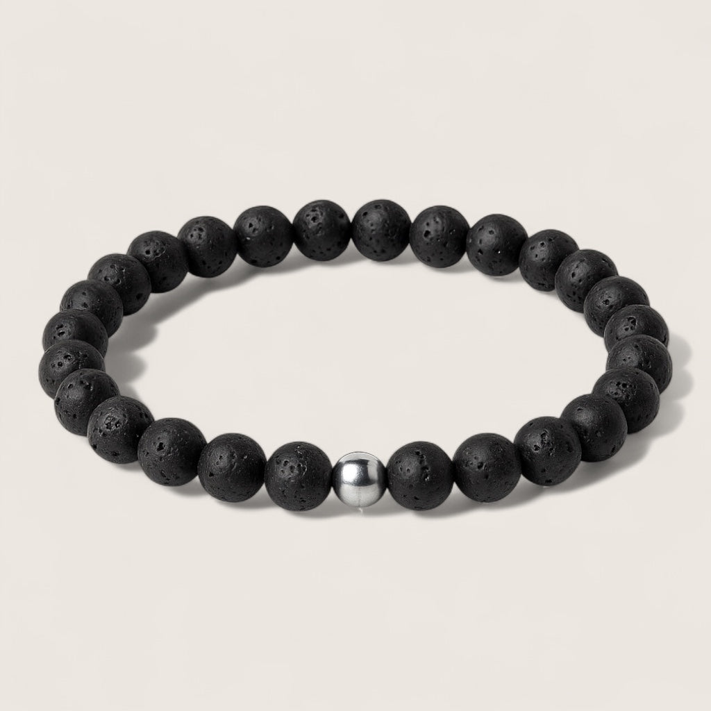Emberstone – Lava Rock Bracelet-Emberstone Lava Rock Bracelet — crafted from natural volcanic stone, symbolizing strength and calm. Features rugged lava beads and a polished steel accent.