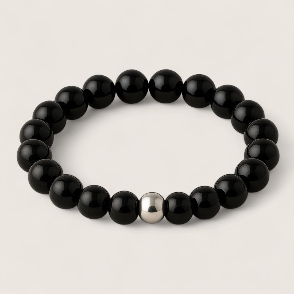 Shadowblade – Black Agate Stretch Bracelet-Forge your style with the Shadowblade Bracelet — polished black agate for strength and grounding. Finished with a steel accent. Available in multiple sizes.