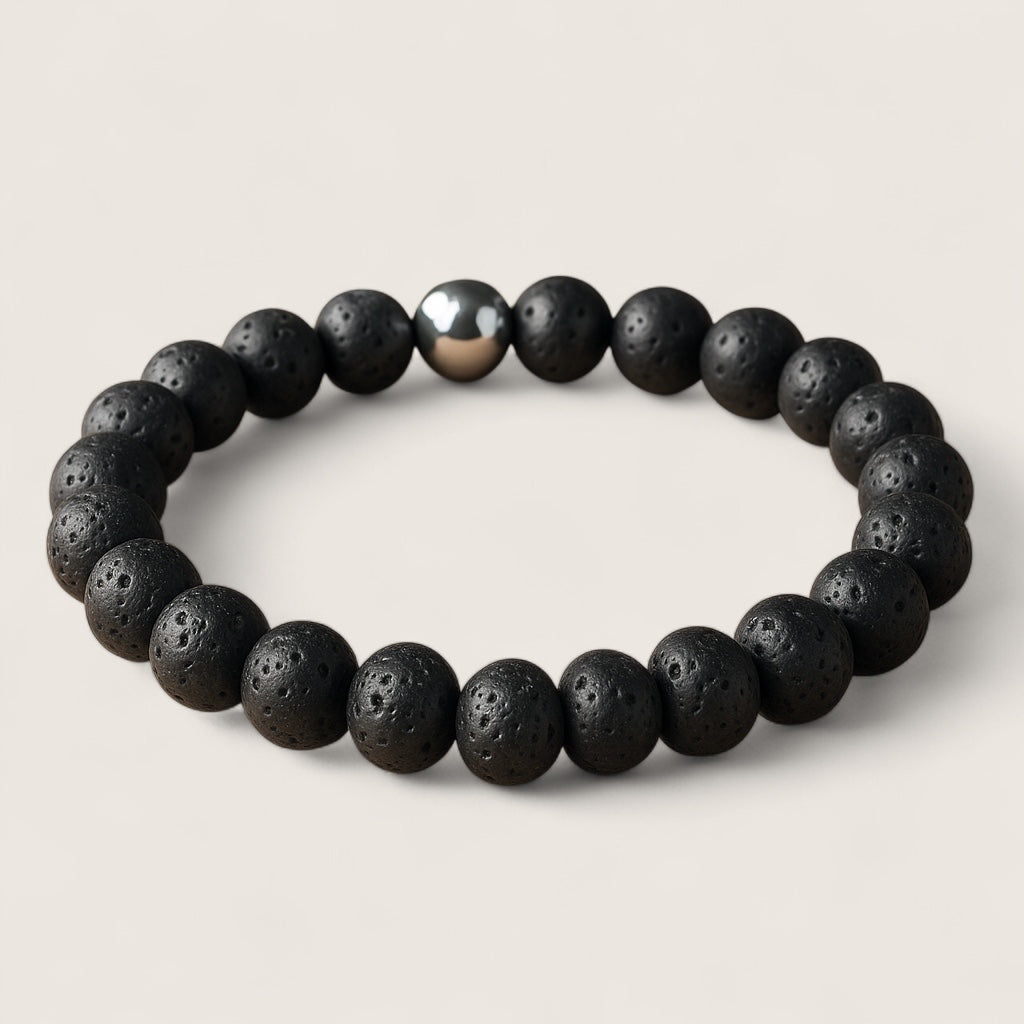 Emberstone – Lava Rock Bracelet-Emberstone Lava Rock Bracelet — crafted from natural volcanic stone, symbolizing strength and calm. Features rugged lava beads and a polished steel accent.
