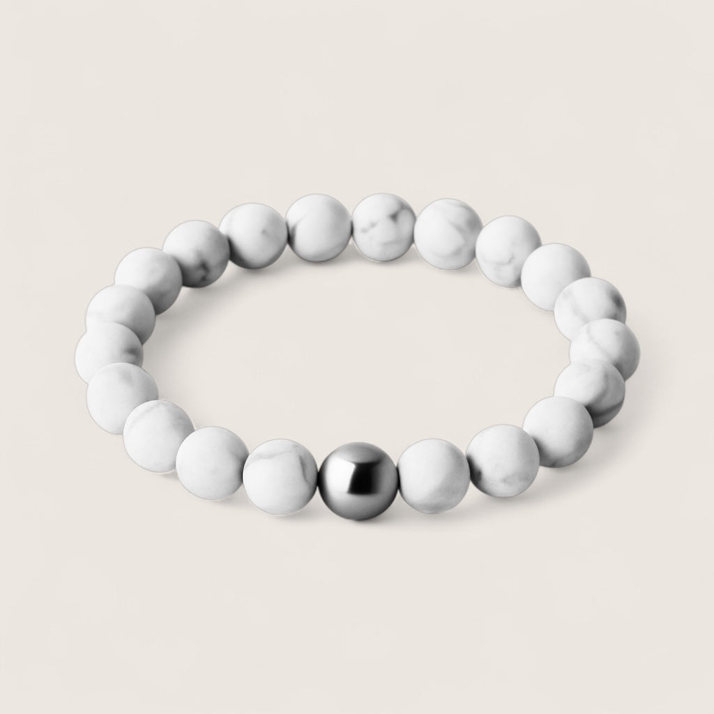 Frostveil – Howlite Stretch Bracelet-Calm your mind and strengthen your spirit with the Frostveil Bracelet. Natural Howlite beads and steel accent offer soothing style and clarity. Shop now.