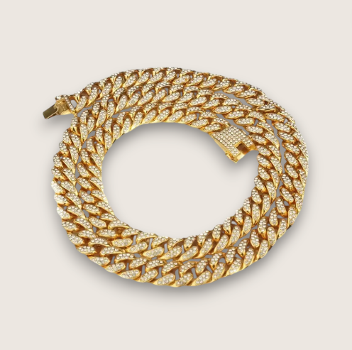 The Avalanche – 12.5 mm Iced Curb Chain-Make an impact with the Avalanche Iced Curb Chain. 12.5mm CZ-encrusted gold or silver chain with secure clasp. Available as bracelet or necklace. Shop now.