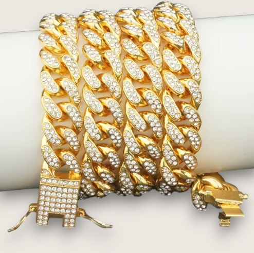The Avalanche – 12.5 mm Iced Curb Chain-Make an impact with the Avalanche Iced Curb Chain. 12.5mm CZ-encrusted gold or silver chain with secure clasp. Available as bracelet or necklace. Shop now.