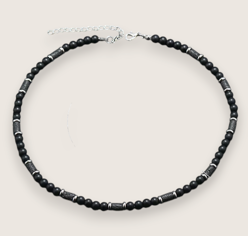 The Ember Forge –Stone & Lava Rock Necklace-Channel primal heat with the Ember Forge Necklace. Tiger eye beads, lava-stone cylinders, and silver spacers—warm, rugged contrast. Adjustable length. Shop now.