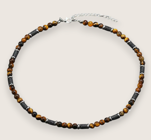 The Ember Forge –Stone & Lava Rock Necklace-Channel primal heat with the Ember Forge Necklace. Tiger eye beads, lava-stone cylinders, and silver spacers—warm, rugged contrast. Adjustable length. Shop now.