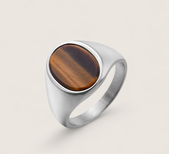The Zenith – Oval Stone Signet Ring-Reach your peak with the Zenith Signet Ring. Polished steel or 18K gold with a recessed oval stone—Black Agate, White Agate, or Tiger Eye. Shop now.