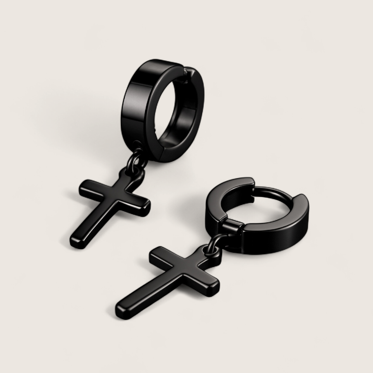 The Creed - Cross Dangle Huggies Earrings-Forge bold style with the Creed Cross Huggies. Polished steel small hoops with dangling cross pendants. Available in steel or gold. Shop now.