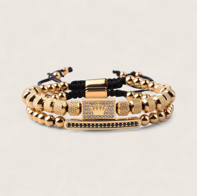 The Crowned Pair- Steel Double Bracelet-Forge your style with the Crowned Pair Bracelet. Dual-strand design with pavé CZ bar and crowned enamel bead. Adjustable black pull-cords. Shop now.