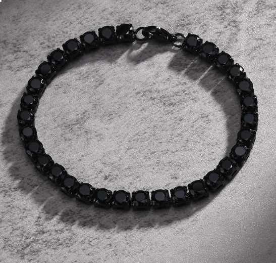 Night Surge Tennis Bracelet-Strike a bold chord with the Blackout Tennis Bracelet. Black-plated steel and deep black CZ stones radiate dark, electrifying intensity. Shop now.