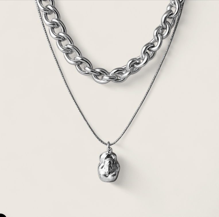 Molten Arc Duo Necklace-Fuel your look with layered steel chains and molten nugget pendant. Bold Voltage style with adjustable curb and snake chains. Shop now.