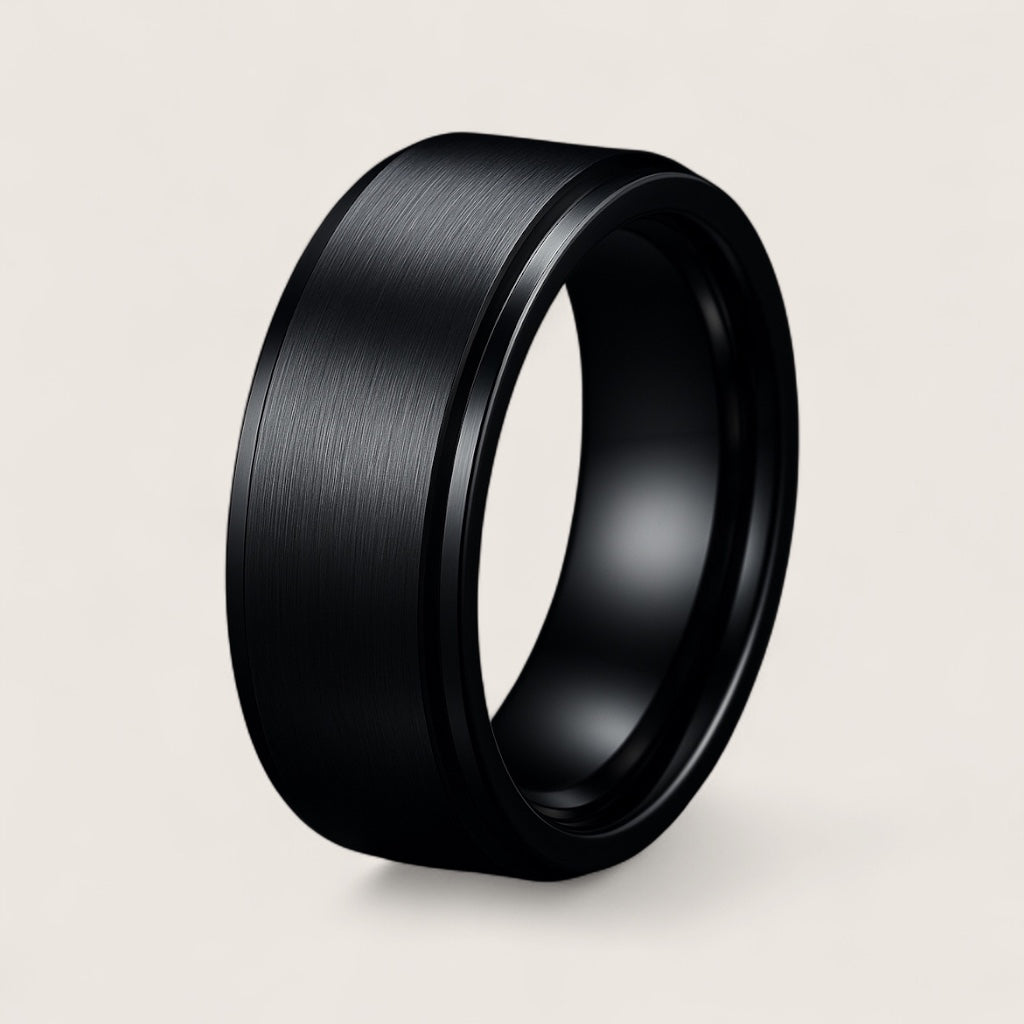 The Axis Spinner – Flat Steel Spinner Ring-Engineered for focus and style—Axis Spinner Ring. 8mm brushed steel band with free-spinning outer ring. Bold design with calming motion. Shop now.