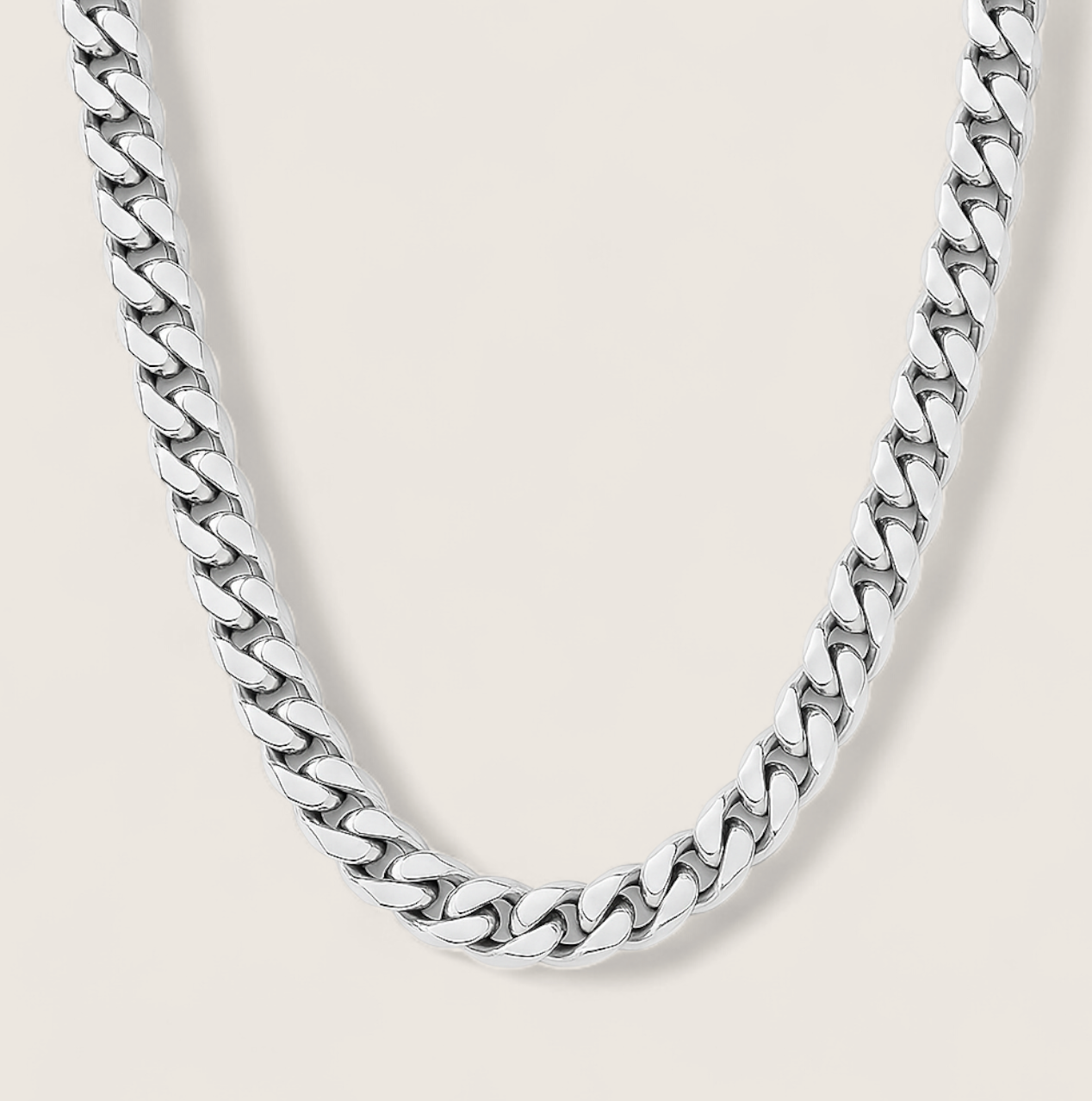 The Argent Curb – 6.7mm Sterling Silver Chain-6.7mm solid sterling silver curb chain. Polished flat links crafted in Italy for bold, versatile style. Wear solo or layered. Shop now.