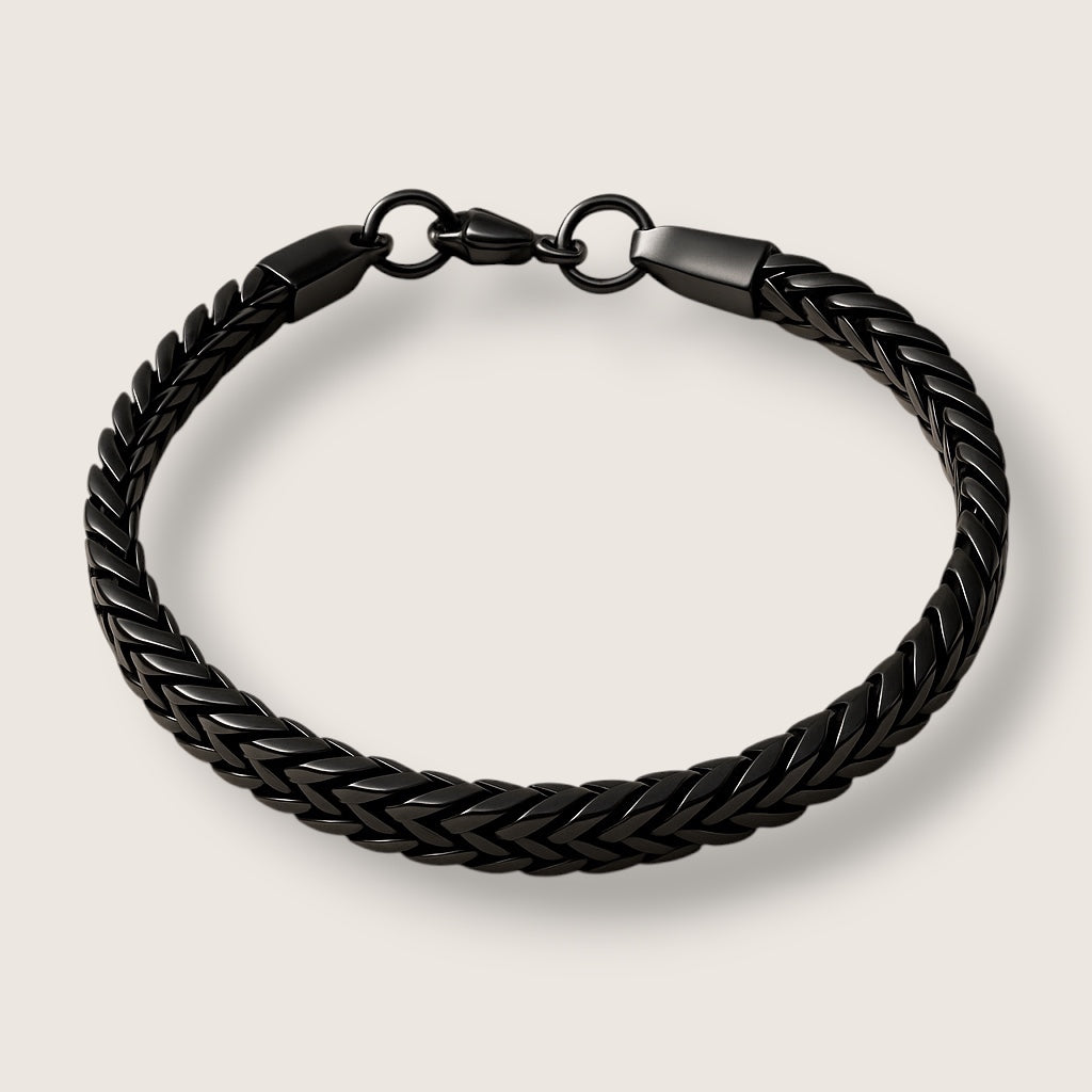The Black Arrow – 5 mm Franco Chain Bracelet-Featuring clean V-shaped links, the 5mm Franco Chain sits flat and sleek. Durable, polished steel—an essential for everyday style. Shop now.