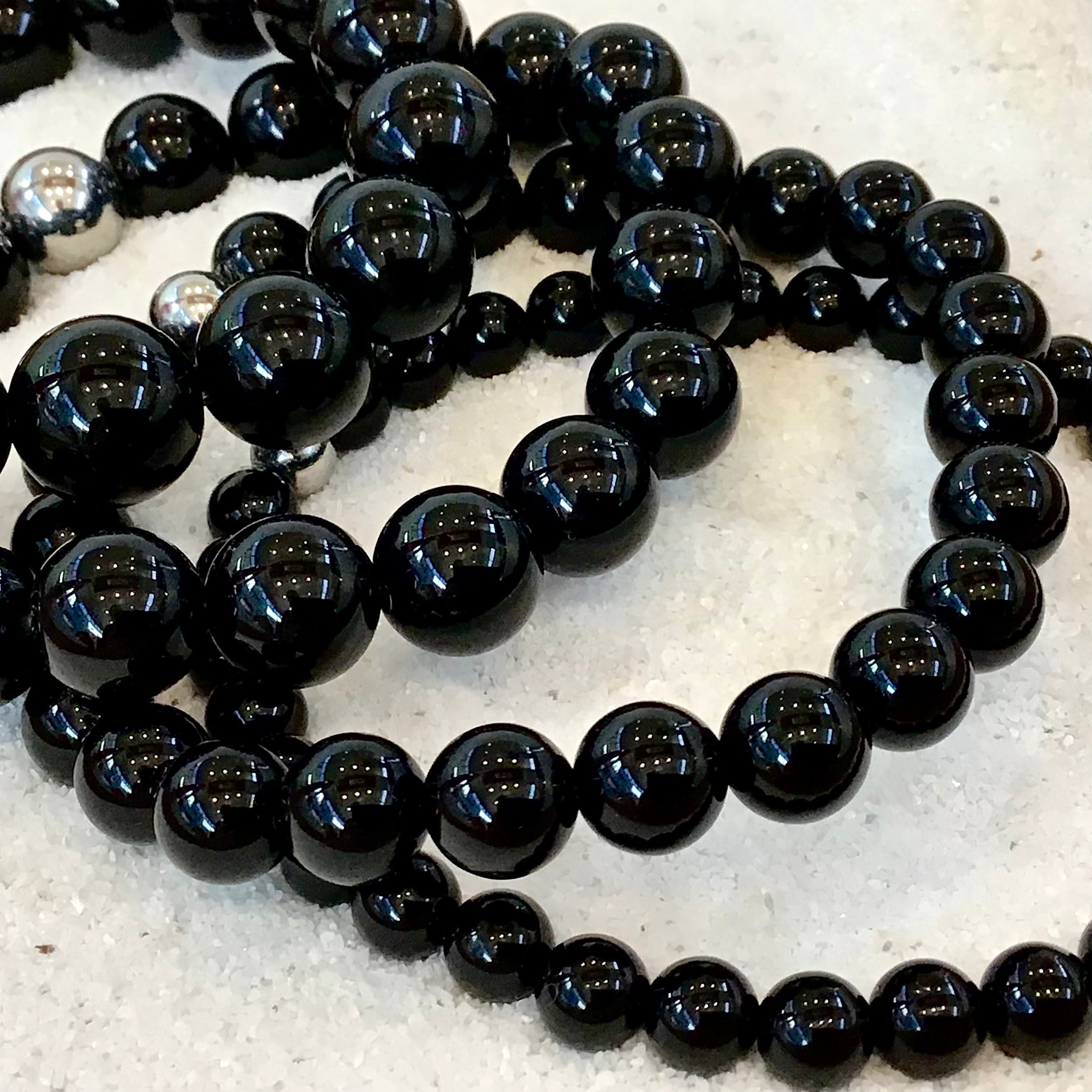 Shadowblade – Black Agate Stretch Bracelet-Forge your style with the Shadowblade Bracelet — polished black agate for strength and grounding. Finished with a steel accent. Available in multiple sizes.