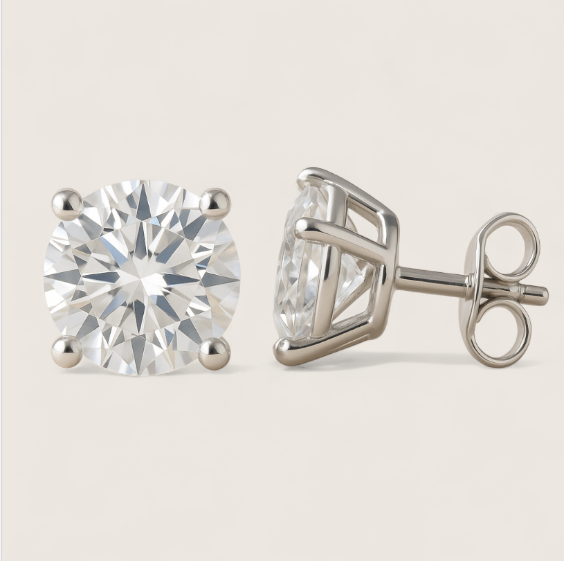 Glacial Ice CZ Studs – Round Earrings-Channel arctic brilliance with CZ studs in rhodium or 14K gold-plated sterling silver. Cool or warm shine to suit your style. Shop now.