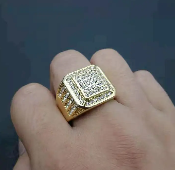 The Sovereign – 18 mm Iced Signet Ring-Elevate your look with the Sovereign Signet Ring. 18mm steel top pavé-set with CZ stones. Polished silver or gold finish. Bold, brilliant style. Shop now.