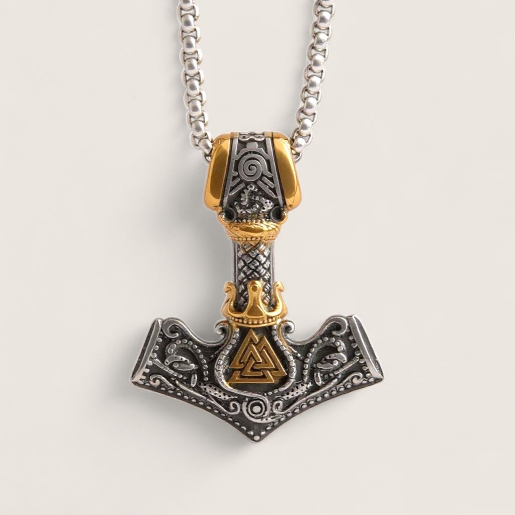 Thor's hammer pendant necklace on a light gray background
