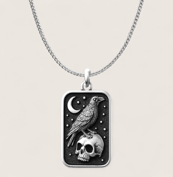 Transform and Live Necklace-Embrace transformation with this symbolic talisman—raven, skull, and crescent moon in bold relief. Part of Anvil&Ore’s limited Talisman Collection.