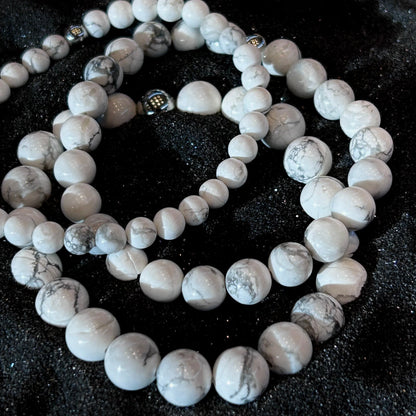 Frostveil – Howlite Stretch Bracelet-Calm your mind and strengthen your spirit with the Frostveil Bracelet. Natural Howlite beads and steel accent offer soothing style and clarity. Shop now.