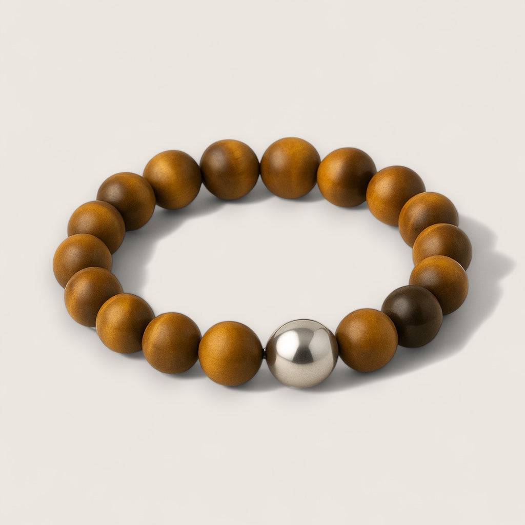 The Sentinel – Tiger Eye Stretch Bracelet-Channel strength, focus, and protection with the Sentinel Bracelet. Natural Tiger Eye beads and steel accent offer bold style and resilience. Shop now.