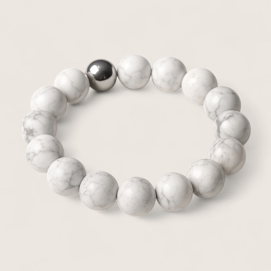 Frostveil – Howlite Stretch Bracelet-Calm your mind and strengthen your spirit with the Frostveil Bracelet. Natural Howlite beads and steel accent offer soothing style and clarity. Shop now.