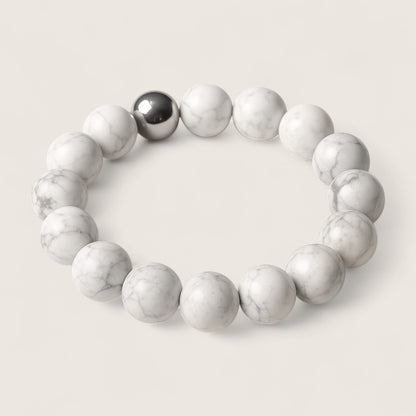 Frostveil – Howlite Stretch Bracelet-Calm your mind and strengthen your spirit with the Frostveil Bracelet. Natural Howlite beads and steel accent offer soothing style and clarity. Shop now.