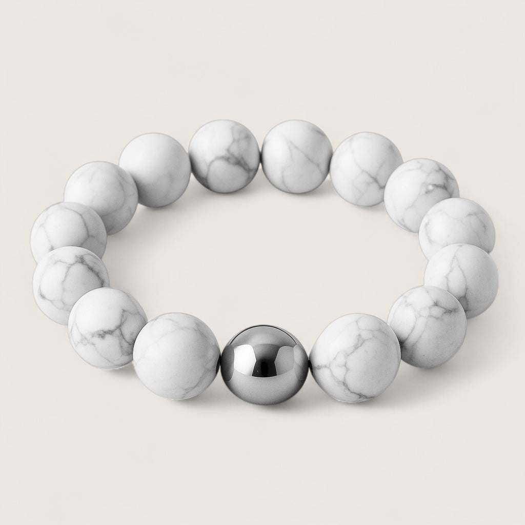 Frostveil – Howlite Stretch Bracelet-Calm your mind and strengthen your spirit with the Frostveil Bracelet. Natural Howlite beads and steel accent offer soothing style and clarity. Shop now.