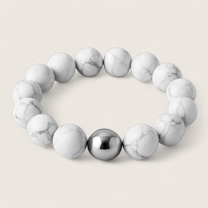 Frostveil – Howlite Stretch Bracelet-Calm your mind and strengthen your spirit with the Frostveil Bracelet. Natural Howlite beads and steel accent offer soothing style and clarity. Shop now.