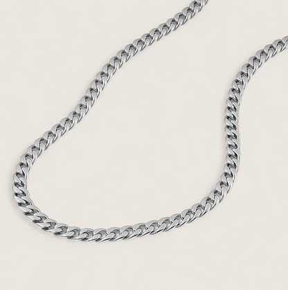 The Argent Curb – 4.5mm Sterling Silver Chain-4.5mm solid sterling silver curb chain. Polished flat links, crafted in Italy. Clean, bold silhouette—wear solo or layered. Shop now.