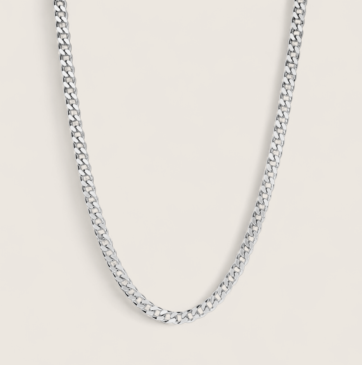The Argent Curb – 4.5mm Sterling Silver Chain-4.5mm solid sterling silver curb chain. Polished flat links, crafted in Italy. Clean, bold silhouette—wear solo or layered. Shop now.