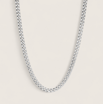 The Argent Curb – 4.5mm Sterling Silver Chain-4.5mm solid sterling silver curb chain. Polished flat links, crafted in Italy. Clean, bold silhouette—wear solo or layered. Shop now.
