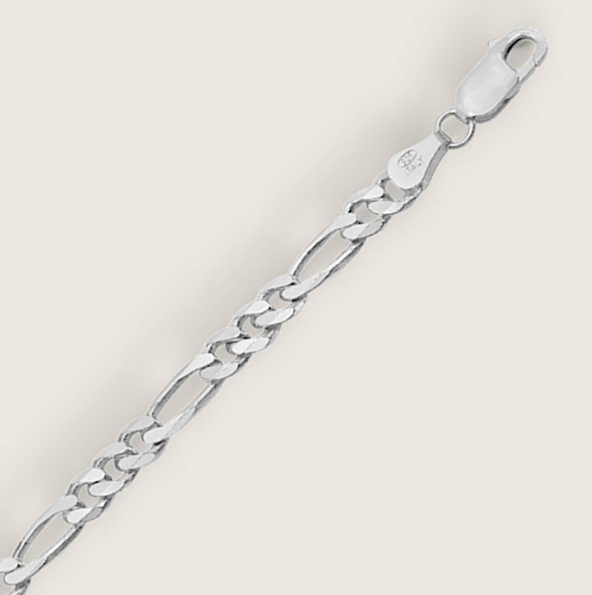 The Argent Figaro – 5.7mm Sterling Silver Chain-Bold 5.7mm sterling silver Figaro chain, diamond-cut for texture and shine. Crafted in Italy. A timeless statement piece. Shop now.