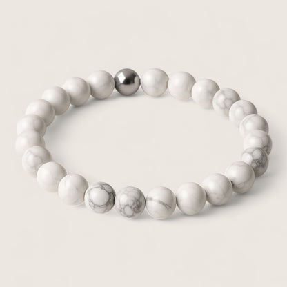 Frostveil – Howlite Stretch Bracelet-Calm your mind and strengthen your spirit with the Frostveil Bracelet. Natural Howlite beads and steel accent offer soothing style and clarity. Shop now.