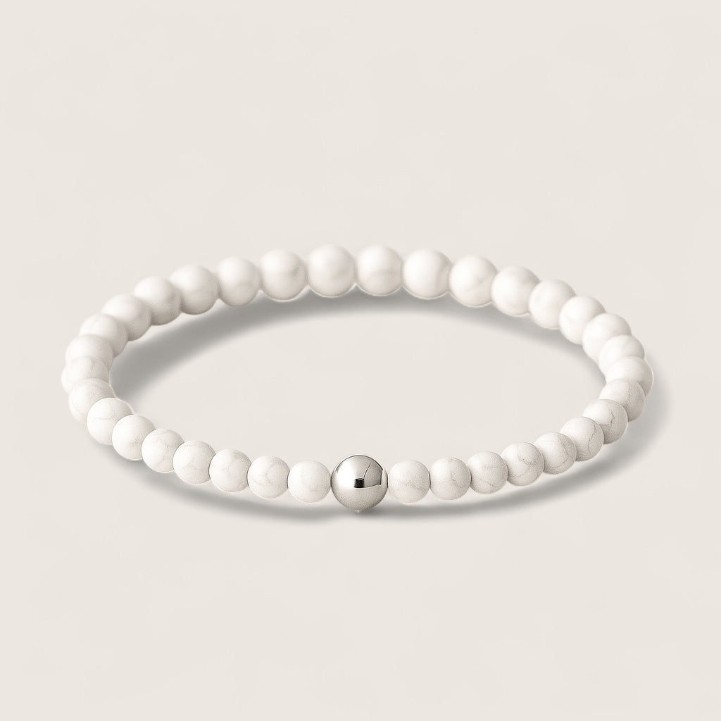 Frostveil – Howlite Stretch Bracelet-Calm your mind and strengthen your spirit with the Frostveil Bracelet. Natural Howlite beads and steel accent offer soothing style and clarity. Shop now.