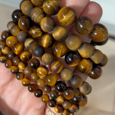 The Sentinel – Tiger Eye Stretch Bracelet-Channel strength, focus, and protection with the Sentinel Bracelet. Natural Tiger Eye beads and steel accent offer bold style and resilience. Shop now.