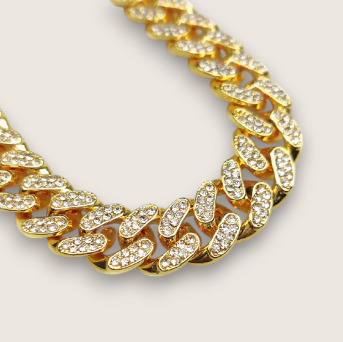 The Avalanche – 12.5 mm Iced Curb Chain-Make an impact with the Avalanche Iced Curb Chain. 12.5mm CZ-encrusted gold or silver chain with secure clasp. Available as bracelet or necklace. Shop now.