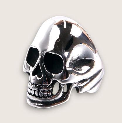 The Reaper – Skull Statement Ring-Forge your look with the Reaper Skull Ring. Bold 29mm polished steel ring with intricate skull detail. Command attention with this statement piece. Shop now.