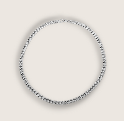 The Ironclad – Steel Cuban Curb Chain-Inject bold style with the Ironclad Cuban Curb Chain. Polished steel or gold-plated, 3.5–11mm widths. Industrial strength meets timeless edge. Shop now.
