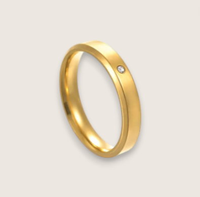 The Solis Solitaire – Flat Stainless Steel Ring-Discover The Solis Solitaire: a sleek 4 mm or 6 mm flat stainless steel ring in silver or gold finish, featuring a bezel-set CZ for refined minimalism. Shop Now