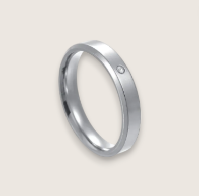The Solis Solitaire – Flat Stainless Steel Ring-Discover The Solis Solitaire: a sleek 4 mm or 6 mm flat stainless steel ring in silver or gold finish, featuring a bezel-set CZ for refined minimalism. Shop Now