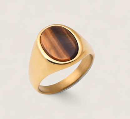 The Zenith – Oval Stone Signet Ring-Reach your peak with the Zenith Signet Ring. Polished steel or 18K gold with a recessed oval stone—Black Agate, White Agate, or Tiger Eye. Shop now.