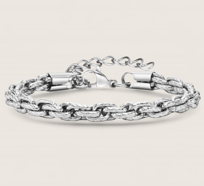 The Vanguard – 6 mm Cuban Rope Bracelet-Forge your path with the Vanguard Rope Chain. 6mm twisted steel in shiny silver or oxidized finish. Rugged texture meets refined polish. Shop now.