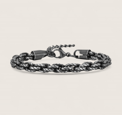 The Vanguard – 6 mm Cuban Rope Bracelet-Forge your path with the Vanguard Rope Chain. 6mm twisted steel in shiny silver or oxidized finish. Rugged texture meets refined polish. Shop now.