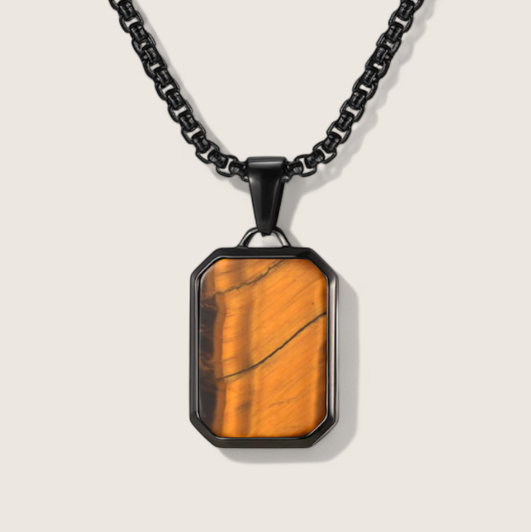 The Aegis - Tiger Eye Dog tag Necklace-Channel nature’s power with the Aegis Pendant. Tiger eye stone set in polished, gold, or matte black steel. Bold geometric style on a 24" chain. Shop now.