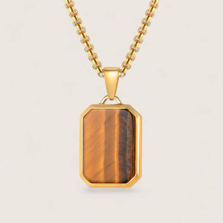 The Aegis - Tiger Eye Dog tag Necklace-Channel nature’s power with the Aegis Pendant. Tiger eye stone set in polished, gold, or matte black steel. Bold geometric style on a 24" chain. Shop now.